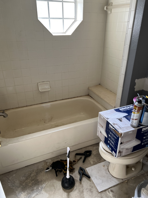 Bathroom Before Flooring and New Toilet