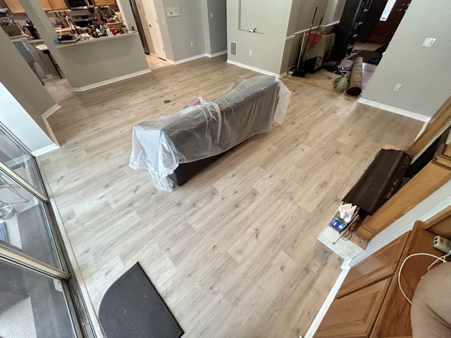 Living Room After Paint and Vinyl Plank