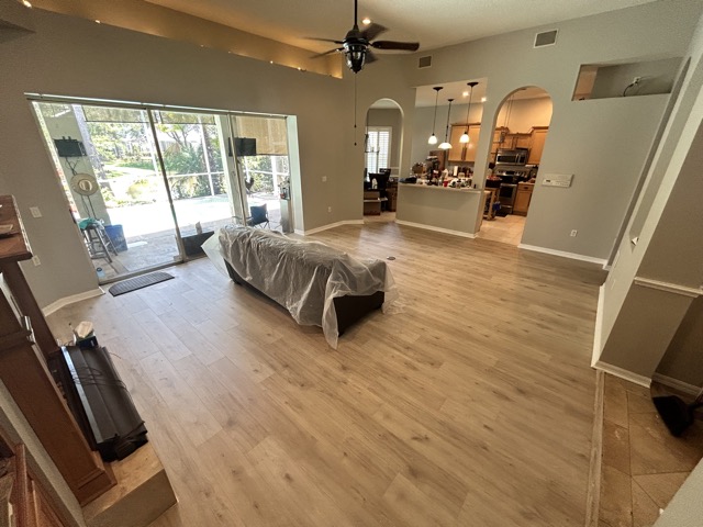 Living Room After Paint and Vinyl Plank