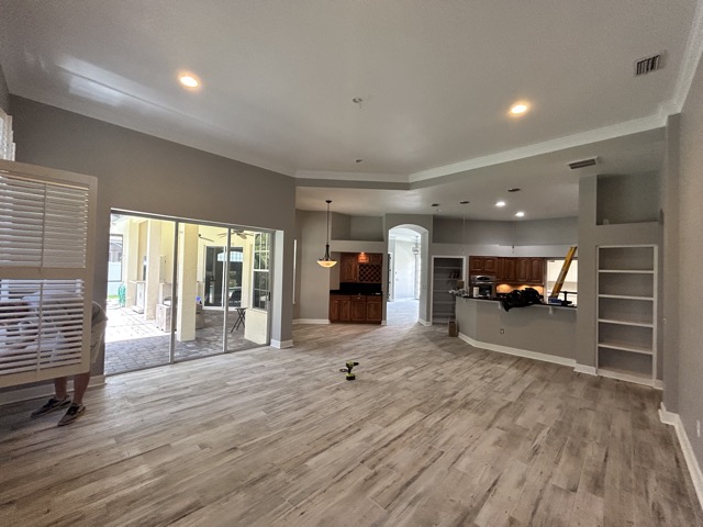 Living Room After Ceiling, Trim, and Wall Paint 